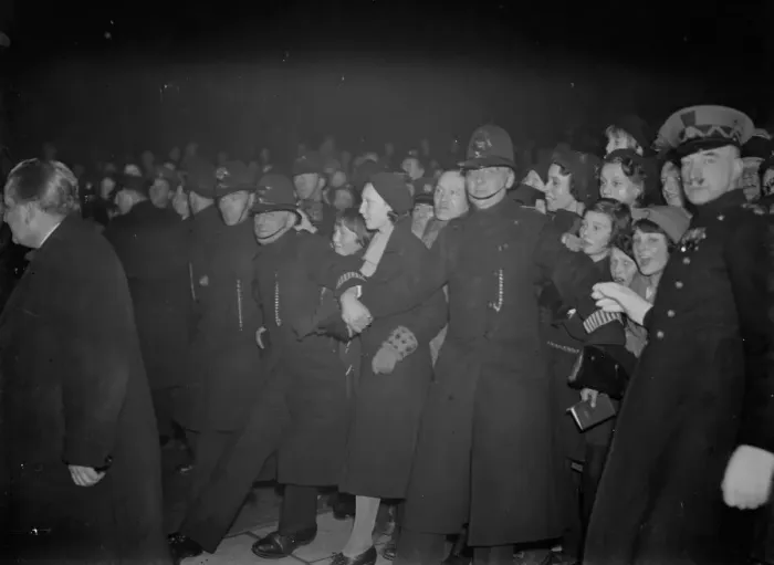 Framed Print : Enthusiastic crowds being held back by police and cinema ushers at the opening of Framed Print : Enthusiastic crowds being held back by police and cinema ushers at the opening of