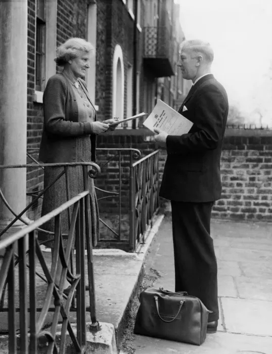 Framed Print : An enumerator seen collecting Census papers when on his rounds in Kennington, London