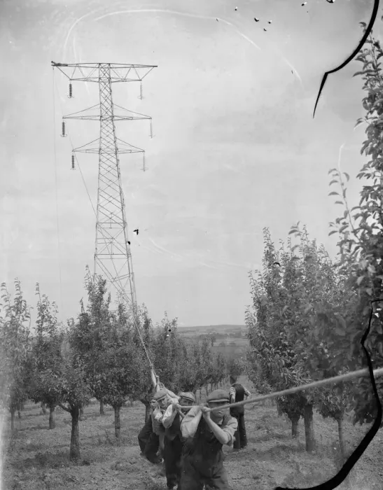 Framed Print : Erecting electricity pylon wires on a grid in Gravesend, Kent. 1939 Framed Print : Erecting electricity pylon wires on a grid in Gravesend, Kent. 1939