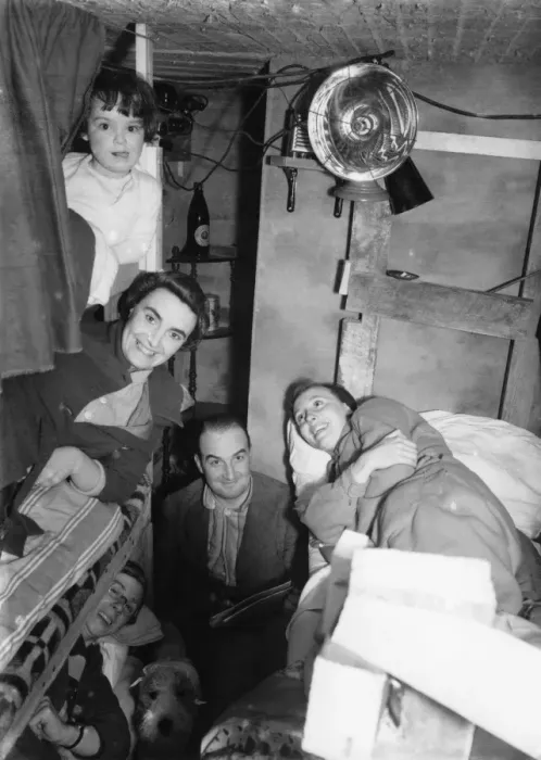 Framed Print : Family of five with their dog in an air raid shelter in Kent in WWII