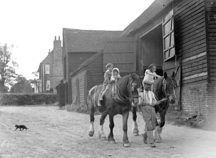 Framed Print : Farm scene: children on horses in the evening. 1934 Framed Print : Farm scene: children on horses in the evening. 1934