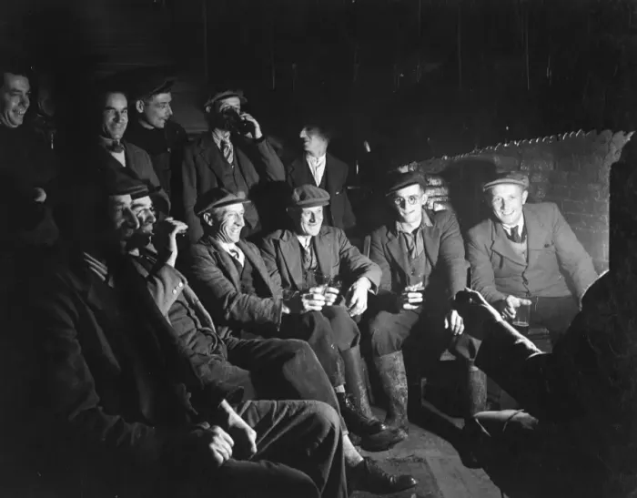 Framed Print : Farm workers relax after a days work with a beer and a chat at a country pub Framed Print : Farm workers relax after a days work with a beer and a chat at a country pub