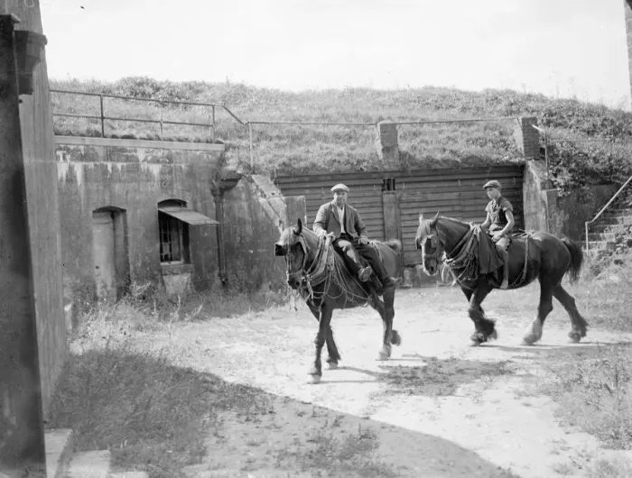 Framed Print : Farm workers ride work horses past an old Fort on their farm at Farningham, Kent Framed Print : Farm workers ride work horses past an old Fort on their farm at Farningham, Kent