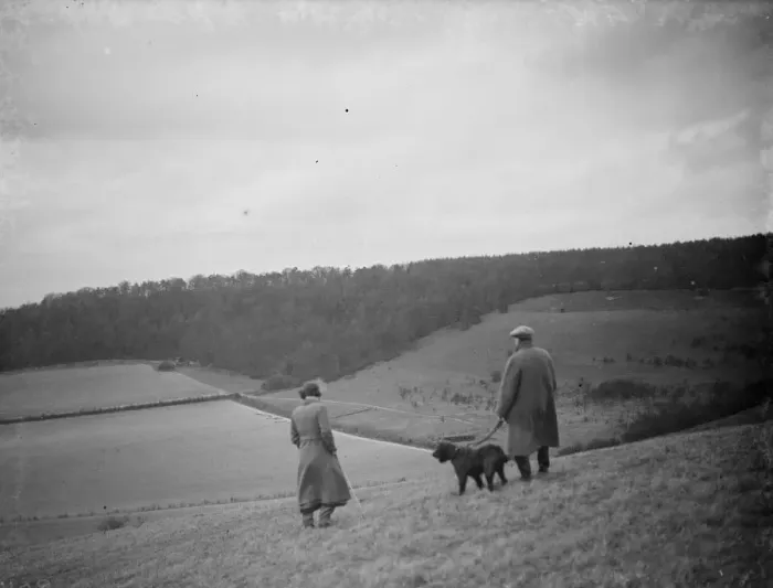 Framed Print : A farmer and his dog stands to view his fields at preston hill farm estate Framed Print : A farmer and his dog stands to view his fields at preston hill farm estate