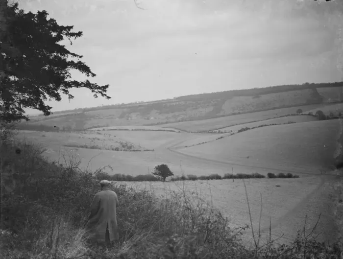 Framed Print : A farmer stands to view his fields at Preston hill farm estate. 3 February 1938 Framed Print : A farmer stands to view his fields at Preston hill farm estate. 3 February 1938