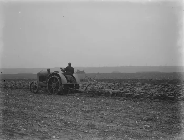Framed Print : A farmer on a tractor ploughing a field near Swanley, Kent. 1936 Framed Print : A farmer on a tractor ploughing a field near Swanley, Kent. 1936
