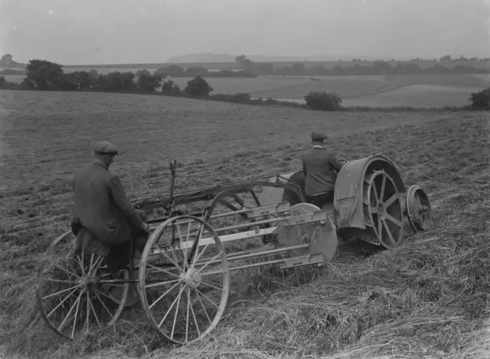 Framed Print : Farmers using a new tractor drawn haymaking machine on a field in Farningham, Kent
