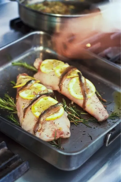 Framed Print : Fillets of monkfish in pan ready to be roasted on bed of rosemary with lemon Framed Print : Fillets of monkfish in pan ready to be roasted on bed of rosemary with lemon