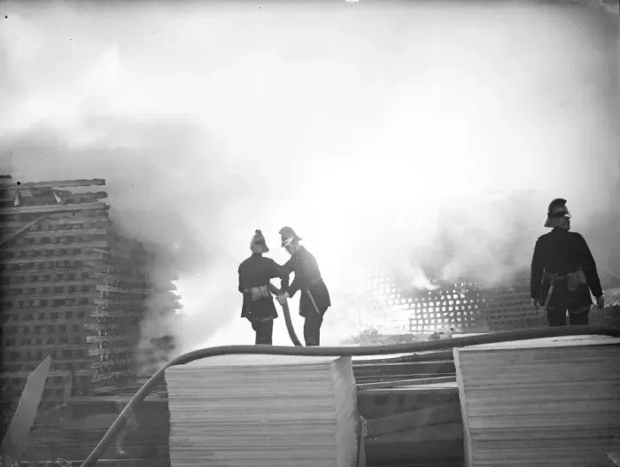 Framed Print : Firemen train their hoses on the flames at the timber fire at Welling in Kent Framed Print : Firemen train their hoses on the flames at the timber fire at Welling in Kent