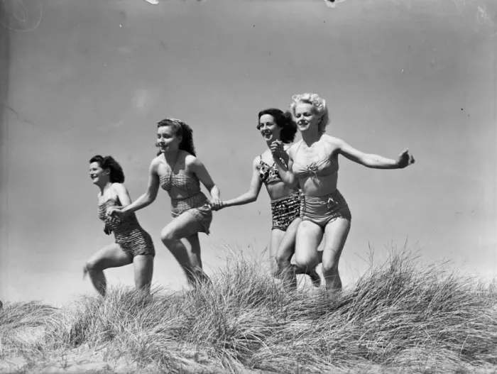 Framed Print : First dip of the season was a happy occasion for these holiday girls at Bournemouth