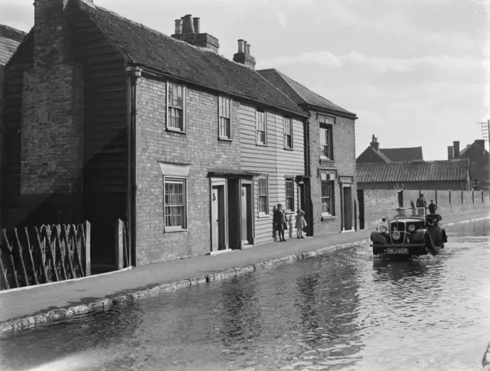 Framed Print : The flooded Watering Lane in Faversham, Kent. 1937 Framed Print : The flooded Watering Lane in Faversham, Kent. 1937