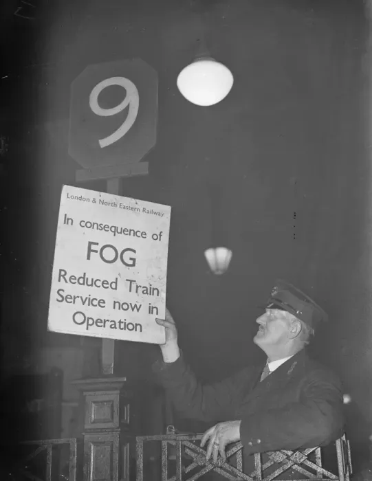 Framed Print : Fog delays trains at Liverpool Street. There was much delay to many INER trains
