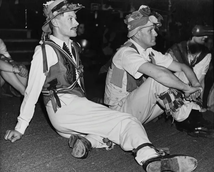 Framed Print : Folk Dance Festival. Lads from the country take a breather: their costumes are adorned Framed Print : Folk Dance Festival. Lads from the country take a breather: their costumes are adorned