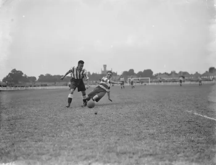 Framed Print : Footballers at Dartford. Two players compete for the ball. 1936 Framed Print : Footballers at Dartford. Two players compete for the ball. 1936
