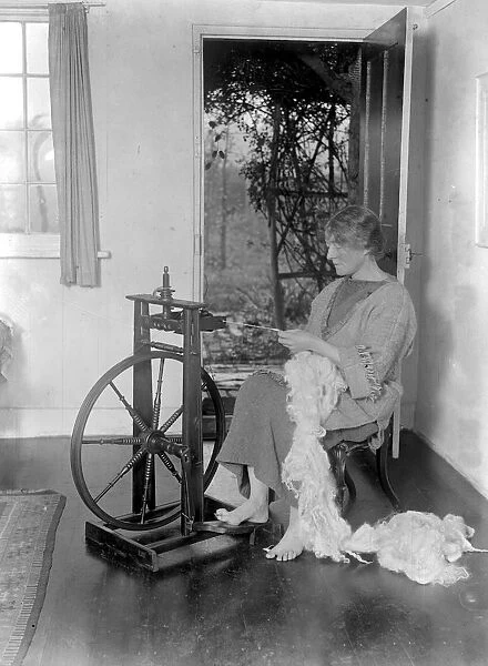 The fraternity weavers at South Holmwood. At work with the spinning wheel. 11 November
