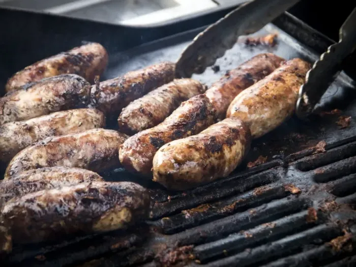 Framed Print : Free range pork sausages being grilled at Penshurst farmers market Framed Print : Free range pork sausages being grilled at Penshurst farmers market