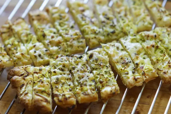 Framed Print : Freshly baked cheese straws cooling on rack, made with grated courgette and grated Framed Print : Freshly baked cheese straws cooling on rack, made with grated courgette and grated