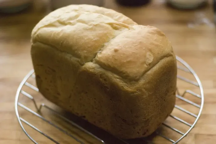 Framed Print : Freshly baked white loaf rack cooling on wire rack credit: Marie-Louise Avery / Framed Print : Freshly baked white loaf rack cooling on wire rack credit: Marie-Louise Avery /