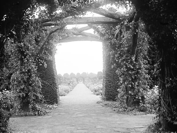 The gardens at the Kings country house, Sandringham, Norfolk. The view through