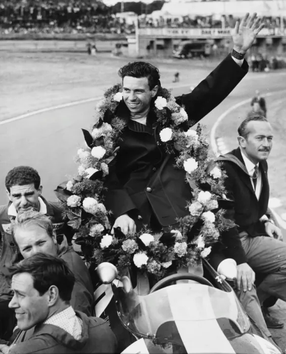 Framed Print : Garlanded Jim Clark. Draped in the victory garland, World Champion Jim Clark of Scotland Framed Print : Garlanded Jim Clark. Draped in the victory garland, World Champion Jim Clark of Scotland