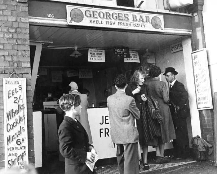 Framed Print : Georges Bar Shell Fish Fresh Daily A queue of people wait to be served but a woman Framed Print : Georges Bar Shell Fish Fresh Daily A queue of people wait to be served but a woman