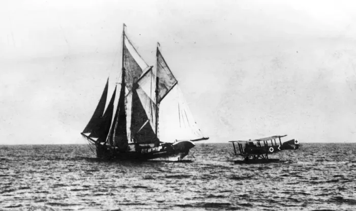 Framed Print : A German seaplane comes down on the water to stop a British sailing ship. 1914 - 1918