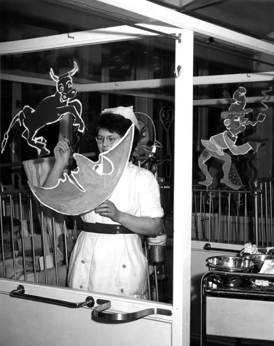 Framed Print : Getting ready for the hospital revels - Nurse Kathleen Burrows is seen is this picture