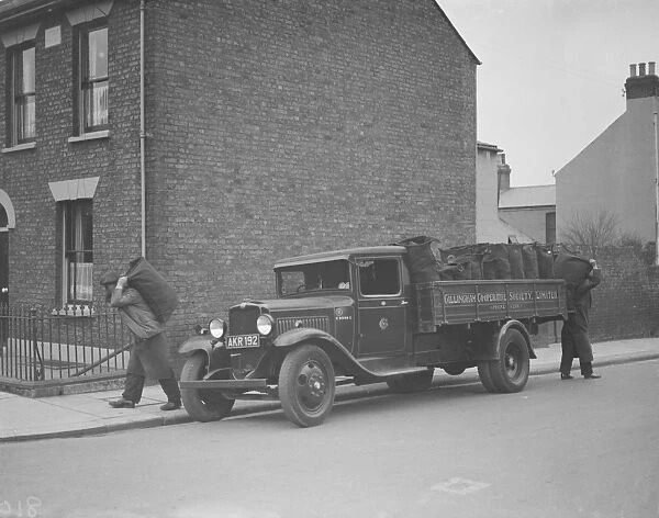 Gillingham Cooperative Society coal merchants making a delivery. 1938