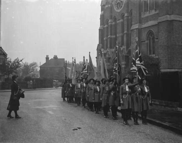 Framed Print : Girl guides during their church parade in front of the Parish Church of St John Framed Print : Girl guides during their church parade in front of the Parish Church of St John