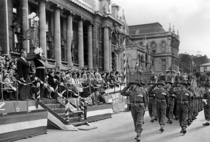 Framed Print : The Governor General takes the salute as New Zealand servicemen march by Parliament