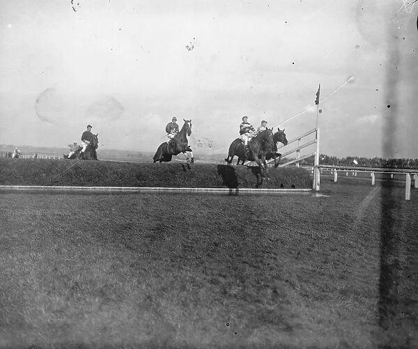 The Grand National Race at Liverpool Taking the water jump 19 March 1921