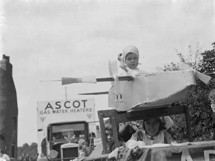 Framed Print : The Gravesend Carnival procession in Kent. A young aviator on his float Framed Print : The Gravesend Carnival procession in Kent. A young aviator on his float
