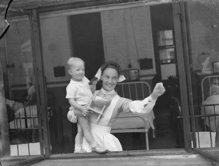 Framed Print : Gravesend Hospital in Kent. Nurse with a child. 1939 Framed Print : Gravesend Hospital in Kent. Nurse with a child. 1939