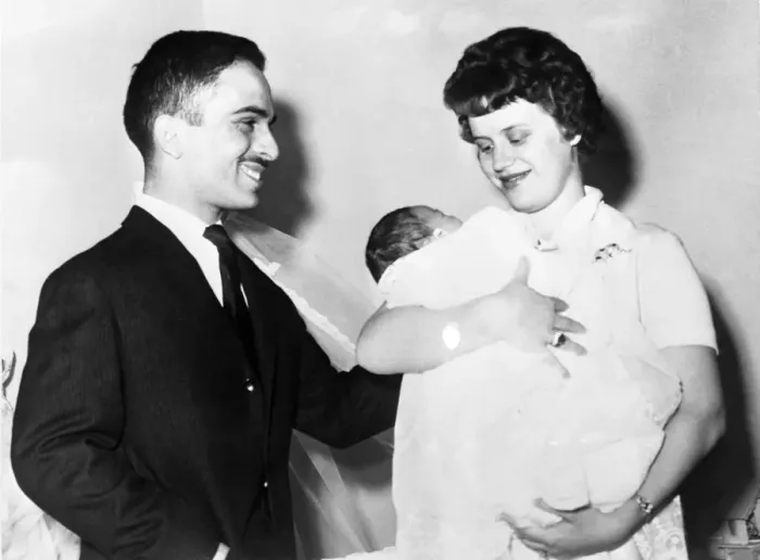Framed Print : A happy King Hussein of Jordon looks on as his British born wife Princess Muna admires Framed Print : A happy King Hussein of Jordon looks on as his British born wife Princess Muna admires