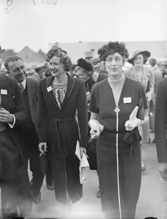 Framed Print : Hat novelties at Ascot. Two novel hat styles seen at Ascot on the opening day of