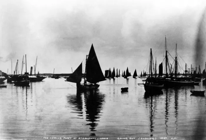 Framed Print : The herring fleet at Stornoway, Lewis, going out in the evening - 1367 ?TopFoto