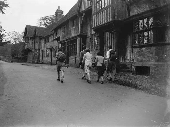 Framed Print : Hikers going through the village of Chiddingstone, Kent. 1933 Framed Print : Hikers going through the village of Chiddingstone, Kent. 1933