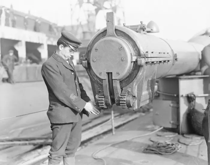 Framed Print : HMS Submarine No 3 One of the crew inspecting the hydraulic water tight cap that Framed Print : HMS Submarine No 3 One of the crew inspecting the hydraulic water tight cap that
