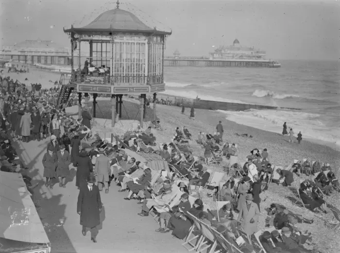 Framed Print : Holiday beach loungers at Eastbourne. So warm has been the weather on the south Framed Print : Holiday beach loungers at Eastbourne. So warm has been the weather on the south