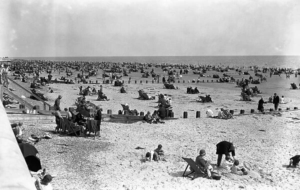 Holidaymakers on the sands at Bognor Regis beach, Sussex. 20 August 1930