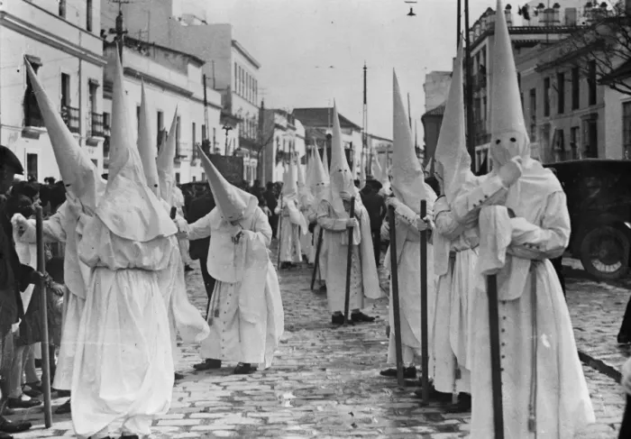 Framed Print : Holy week in Seville. One of the brotherhoods with the Nazarenes. 22 March 1929 Framed Print : Holy week in Seville. One of the brotherhoods with the Nazarenes. 22 March 1929