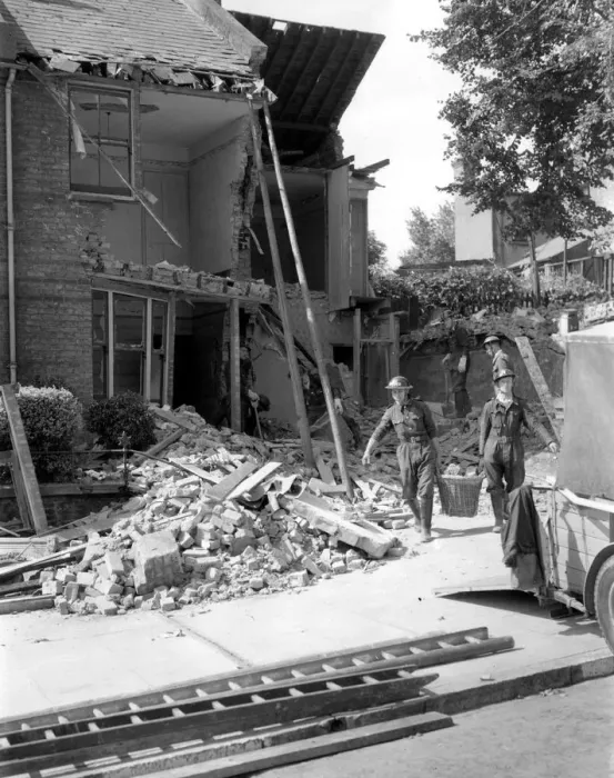 Framed Print : Home front 1940. Destroyed home in the Crayford area, after a German air raid Framed Print : Home front 1940. Destroyed home in the Crayford area, after a German air raid