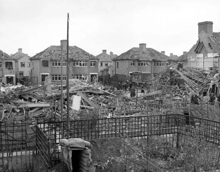 Framed Print : Home front 1940. A residential area showing signs of being heavily damaged after Framed Print : Home front 1940. A residential area showing signs of being heavily damaged after