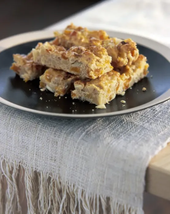 Framed Print : Home made flapjacks stacked on brown plate