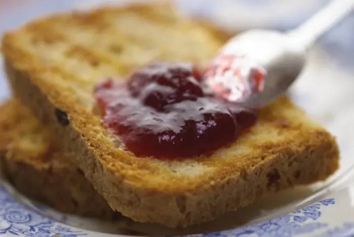 Framed Print : Home made jam on toast made from gluten free bread with silver spoon Framed Print : Home made jam on toast made from gluten free bread with silver spoon