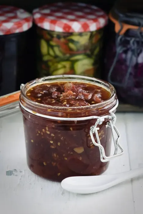 Framed Print : Home made jar of tomato chutney credit: Marie-Louise Avery  /  thePictureKitchen