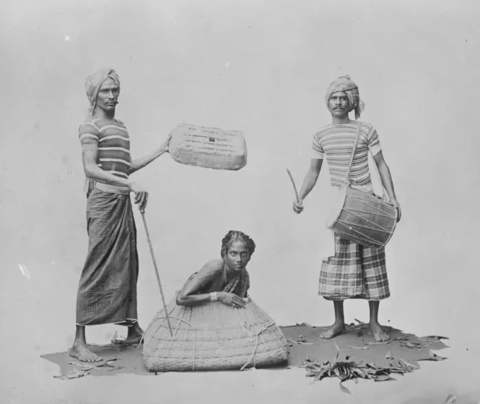 Framed Print : Indian types. An Indian juggler performing the famous basket trick. 1925