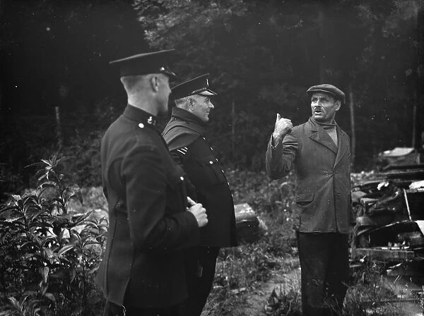 Individuals point out arguments at the demolishing of the shack in Kingsdown. 1936