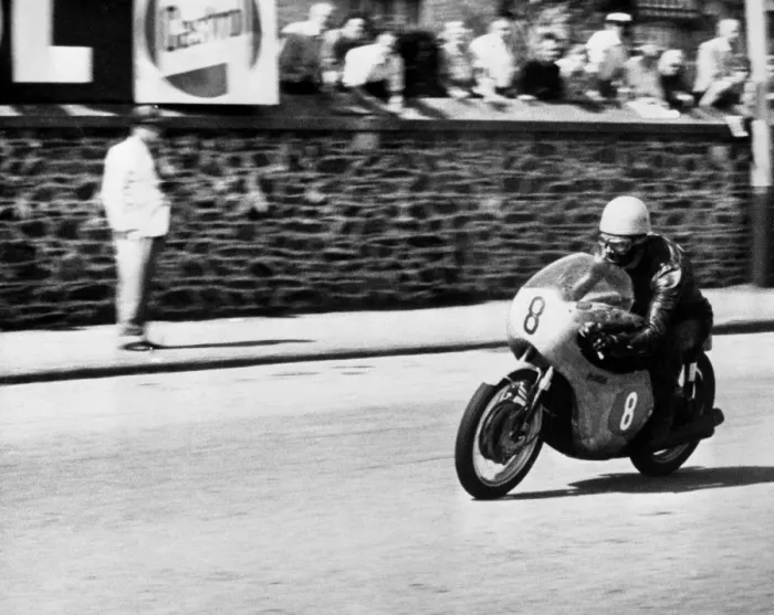 Framed Print : Isle of Man: Jim Redman pictured at speed on his new four-cylinder Honda during Framed Print : Isle of Man: Jim Redman pictured at speed on his new four-cylinder Honda during