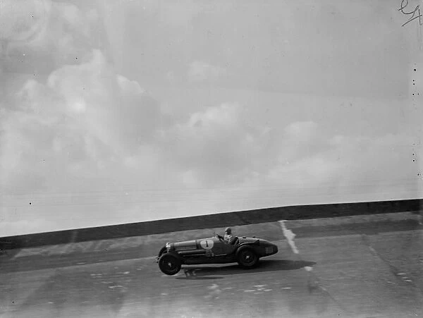 John Cobb on the banking at Brooklands. The Brooklands Automobile Racing Club